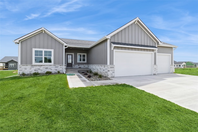 view of front facade with a front lawn and a garage