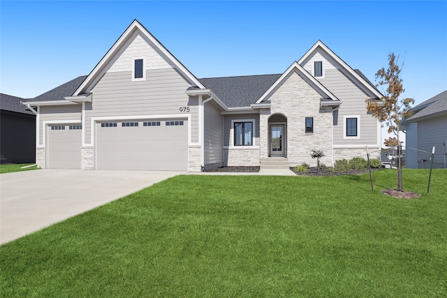 craftsman-style house with a front yard and a garage