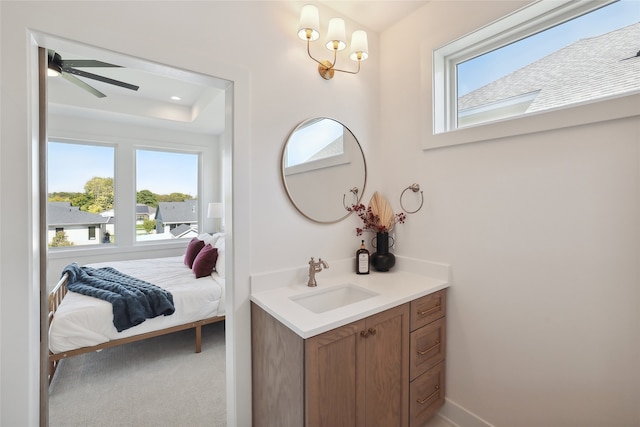 bathroom featuring vanity and ceiling fan