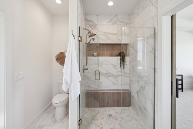 bathroom with toilet and walk in shower