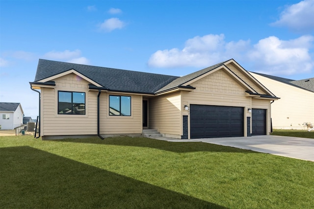 single story home with driveway, roof with shingles, an attached garage, cooling unit, and a front lawn