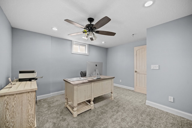 office with light carpet, a textured ceiling, and ceiling fan