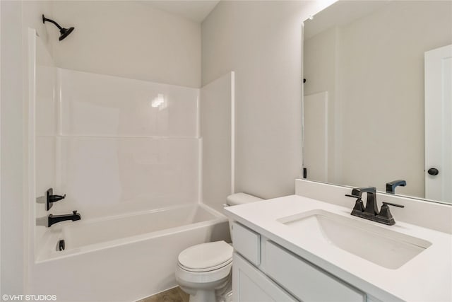 bathroom with  shower combination, vanity, and toilet