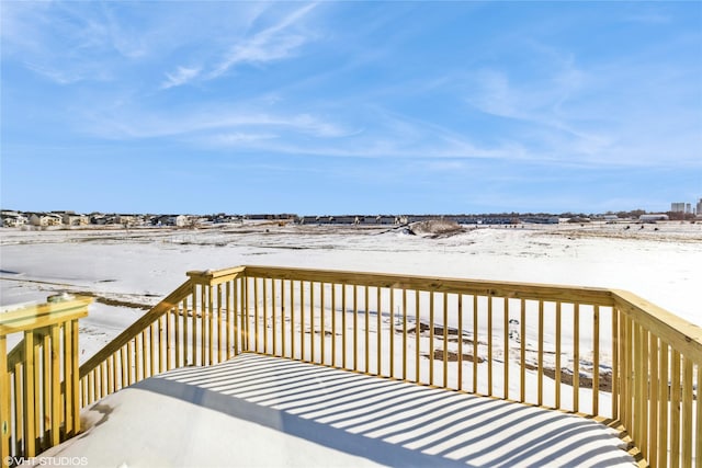 view of snow covered deck