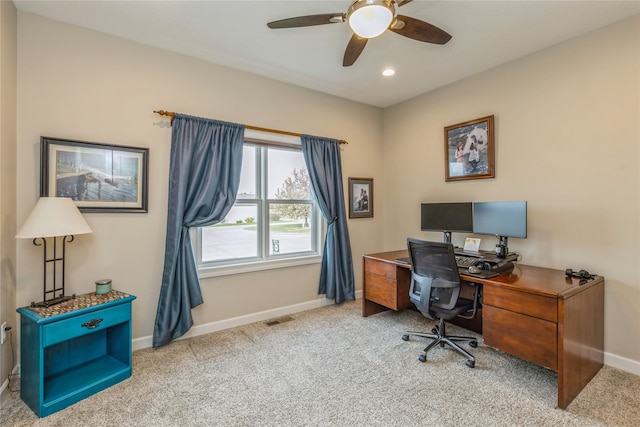 office featuring ceiling fan and light colored carpet