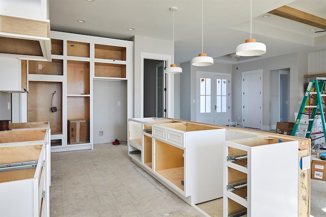 kitchen with a center island and hanging light fixtures