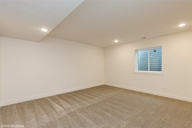 spare room with carpet flooring