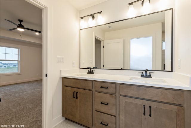 bathroom with vanity and ceiling fan