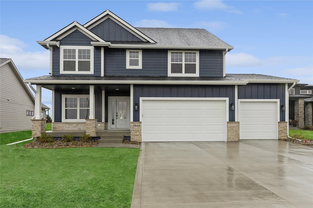 craftsman inspired home featuring concrete driveway, covered porch, board and batten siding, and a front yard