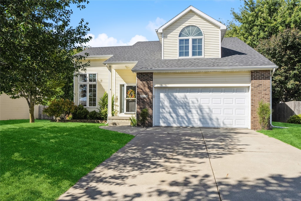 view of front of property with a front lawn