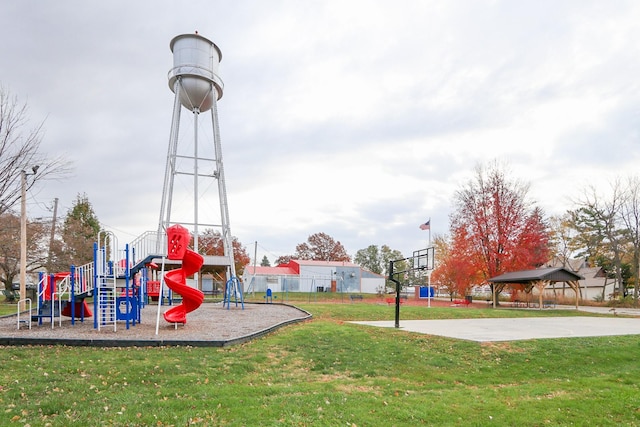 view of jungle gym with a lawn