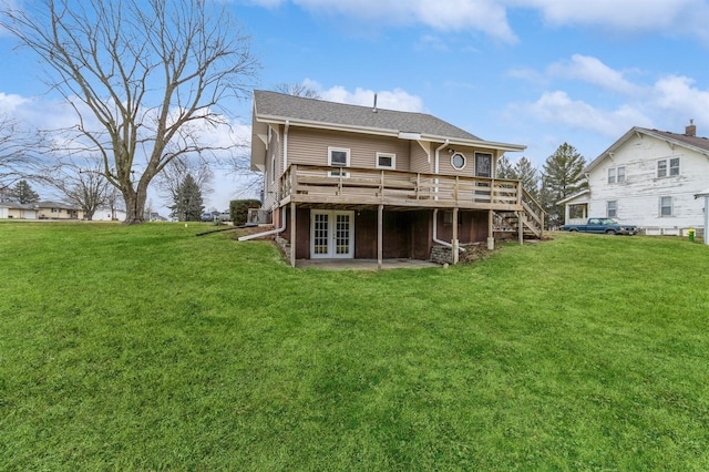 back of house with french doors, a yard, a deck, and a patio area