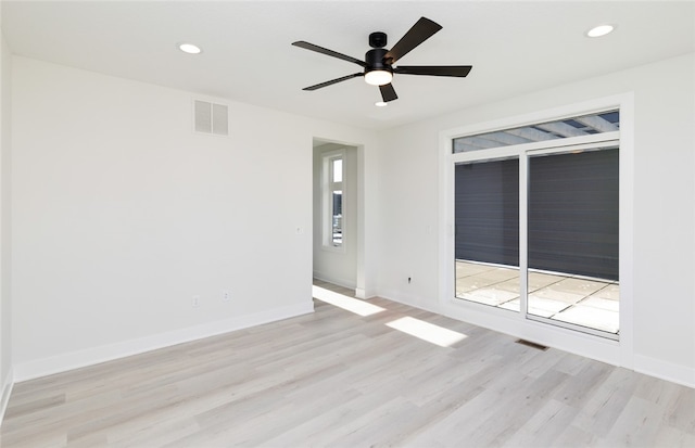 unfurnished room featuring light hardwood / wood-style flooring and ceiling fan