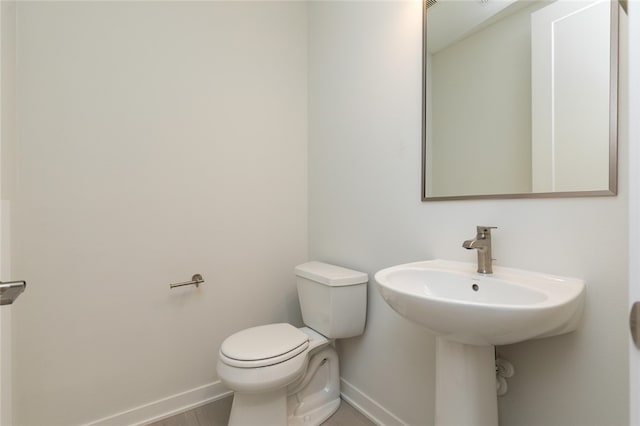 bathroom featuring toilet