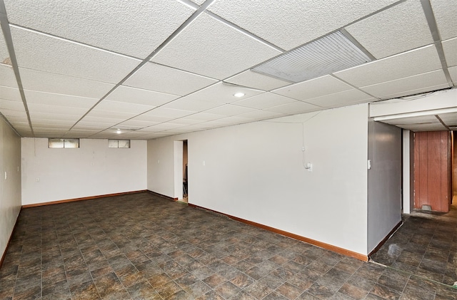 basement with a drop ceiling