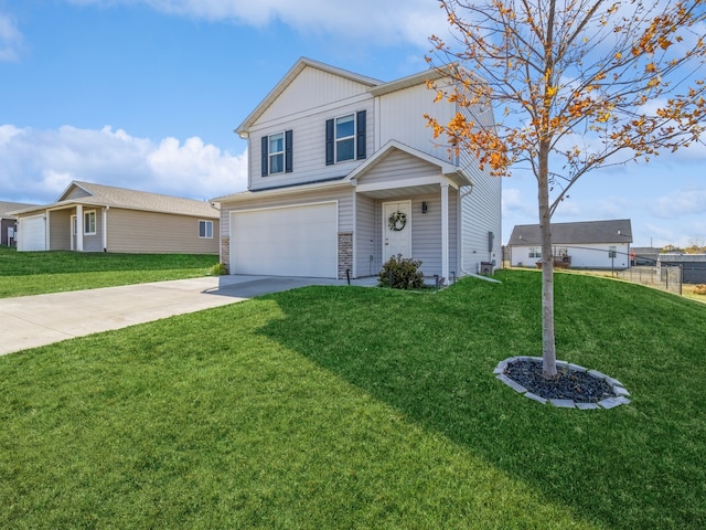 view of front property featuring a front lawn and a garage