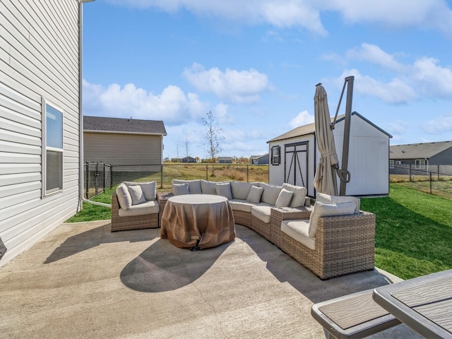 view of patio with a storage unit, fence, an outdoor living space, and an outdoor structure