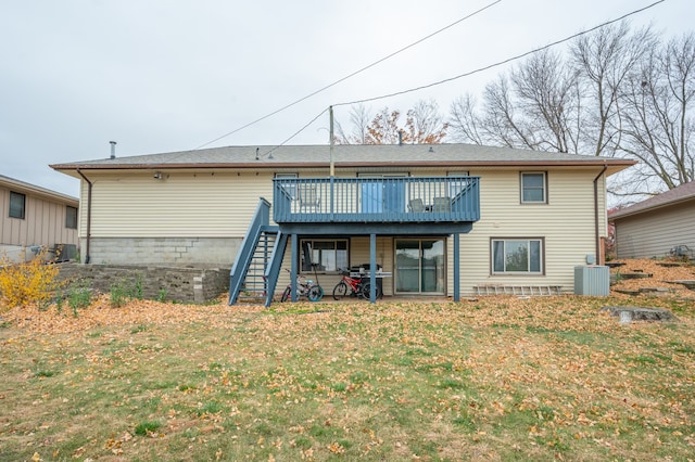 back of house with a yard, a patio, a deck, and central AC unit