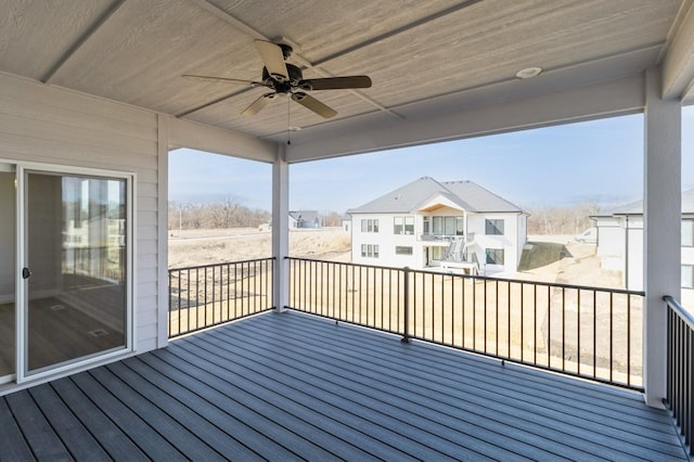 wooden deck with ceiling fan