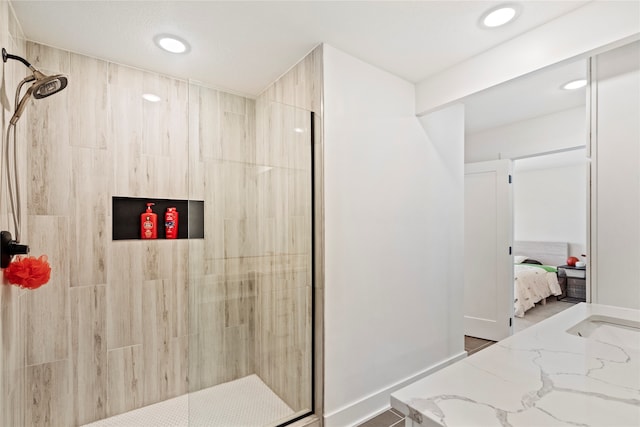 bathroom featuring a tile shower