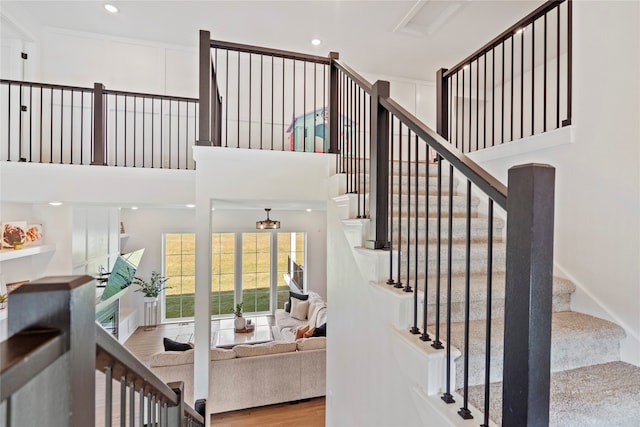 stairs featuring wood-type flooring