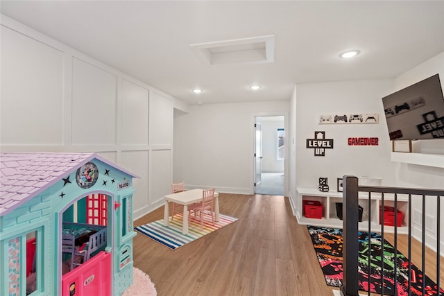 playroom featuring hardwood / wood-style flooring