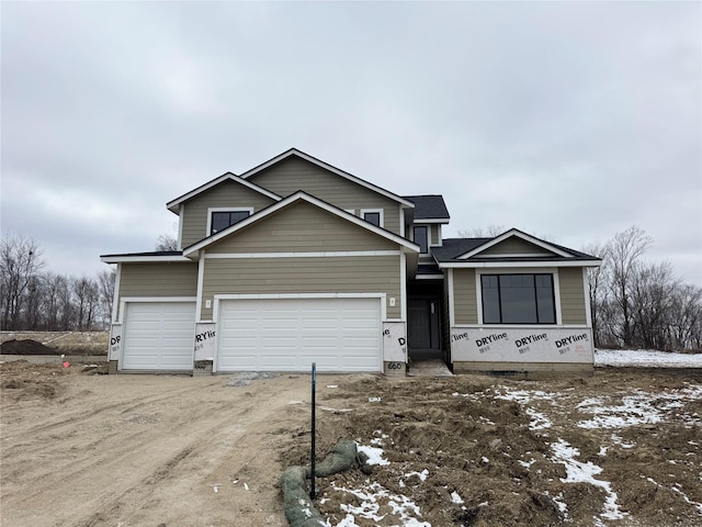 view of front of home with a garage