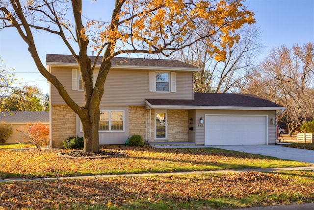 front of property with a garage and a front yard