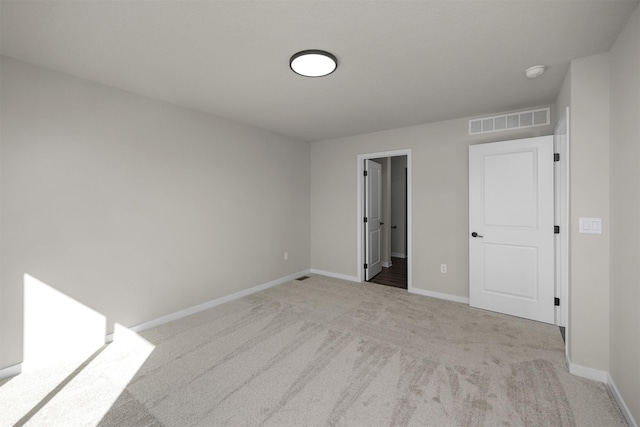 9748 Thorton Dr, Johnston, IA 50131 - carpeted empty room with baseboards and a smoke detector