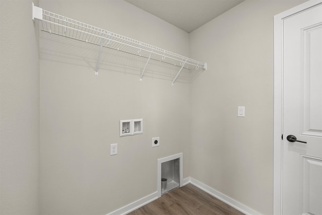 9748 Thorton Dr, Johnston, IA 50131 - washroom featuring hookup for an electric dryer, hookup for a washing machine, dark wood finished floors, and baseboards