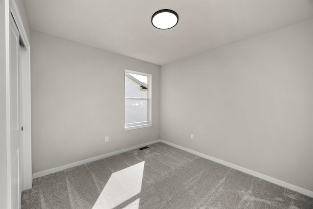 9748 Thorton Dr, Johnston, IA 50131 - unfurnished bedroom featuring carpet floors, baseboards, and a closet