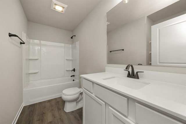 9748 Thorton Dr, Johnston, IA 50131 - bathroom with wood finished floors, toilet, vanity, and  shower combination