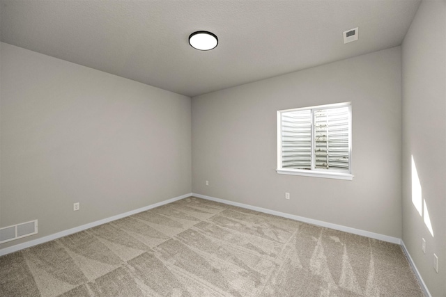 9748 Thorton Dr, Johnston, IA 50131 - empty room featuring light carpet and baseboards