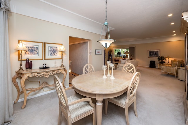 view of carpeted dining space