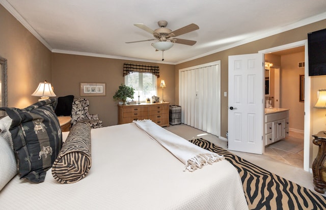 tiled bedroom with a closet, ornamental molding, ensuite bathroom, and ceiling fan