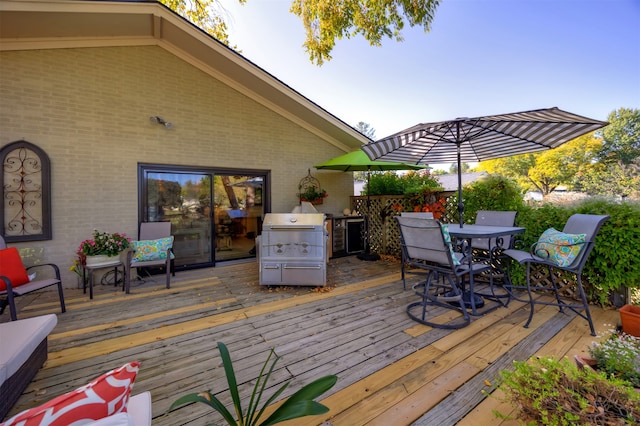 wooden deck with grilling area