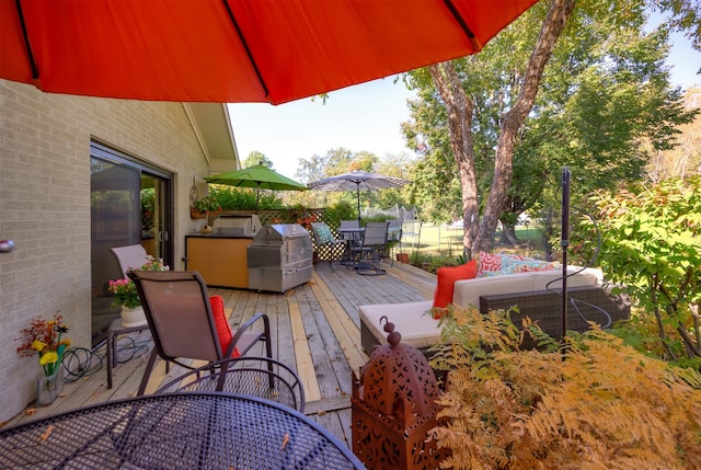 wooden deck featuring grilling area