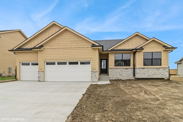 craftsman-style house featuring a garage