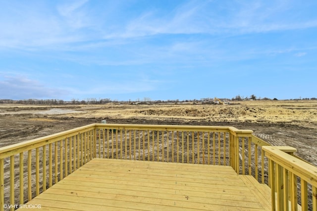 wooden terrace with a rural view