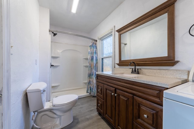 full bathroom with toilet, a shower with curtain, wood finished floors, and vanity