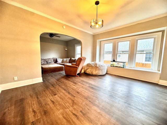 sitting room featuring crown molding, hardwood / wood-style flooring, and ceiling fan