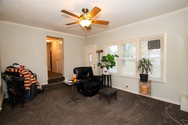 1600 Evergreen Ave, Des Moines, IA 50320 - sitting room featuring carpet, ornamental molding, a ceiling fan, and baseboards