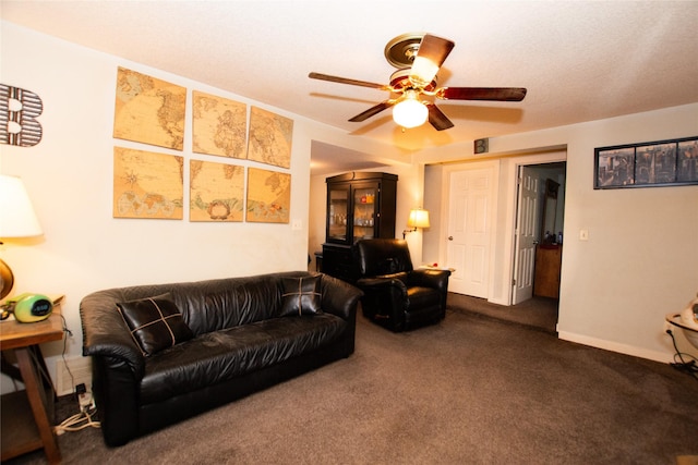 1600 Evergreen Ave, Des Moines, IA 50320 - living area with carpet floors, ceiling fan, and baseboards
