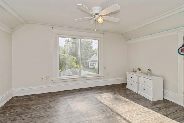 bonus room featuring dark wood-type flooring, ceiling fan, and vaulted ceiling