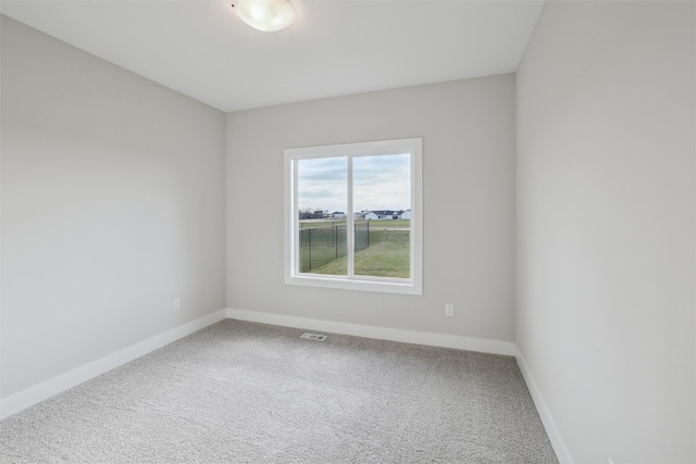 view of carpeted spare room