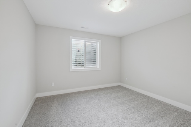 unfurnished room with carpet