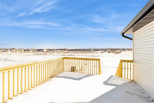 view of snow covered deck