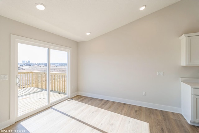 unfurnished dining area with light hardwood / wood-style floors