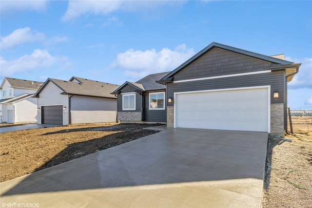 ranch-style home featuring a garage