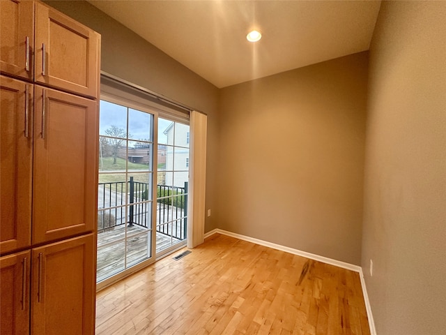 doorway to outside featuring light hardwood / wood-style floors